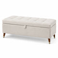 Panca contenitore in tessuto beige con gambe in legno