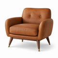 Poltrona in pelle sintetica marrone con gambe in legno