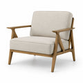 Poltrona in legno con tessuto beige